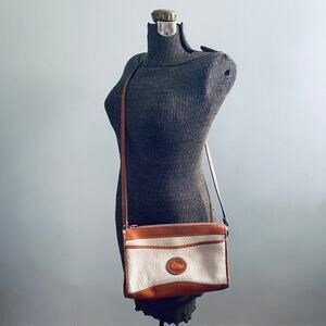 Dooney and Bourke cream and brown leather crossbody